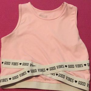 An Active crop top Frim urban planet💞